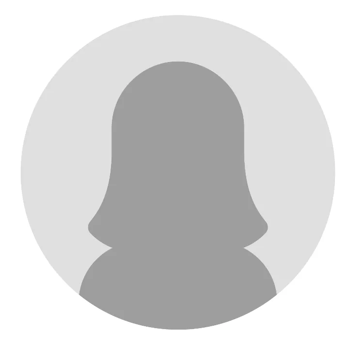 A grey silhouette of a person with a round background.